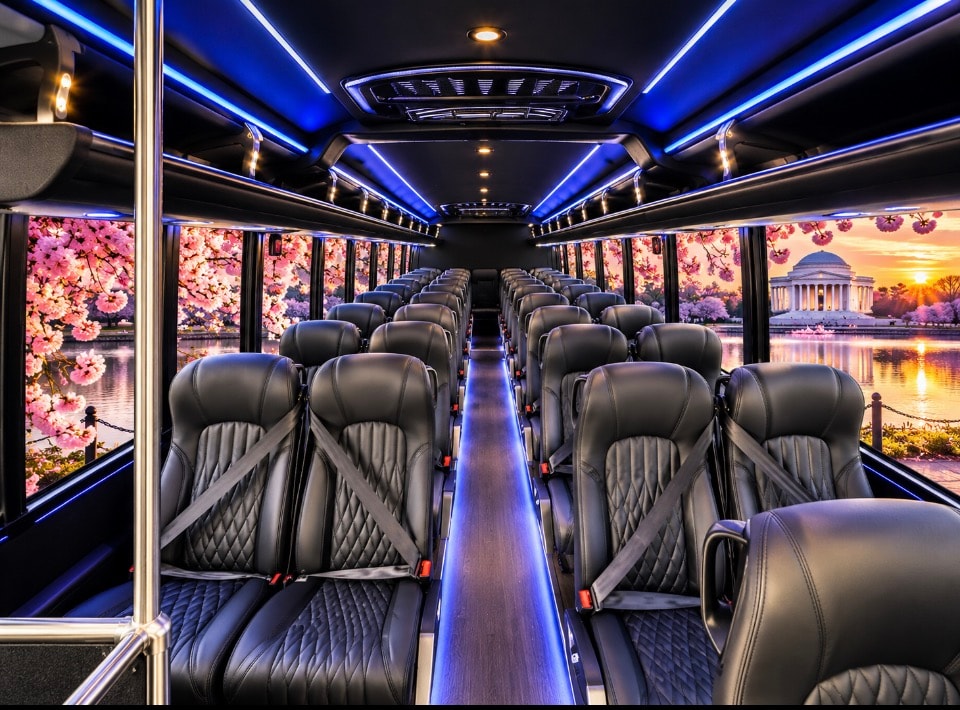 32-40 passenger bus interior blue ceiling lighting quilted black leather seats cherry blossoms Jefferson Memorial panoramic window views