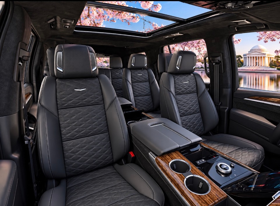 Cadillac Escalade ESV second-row quilted leather captain seats with Jefferson Memorial view