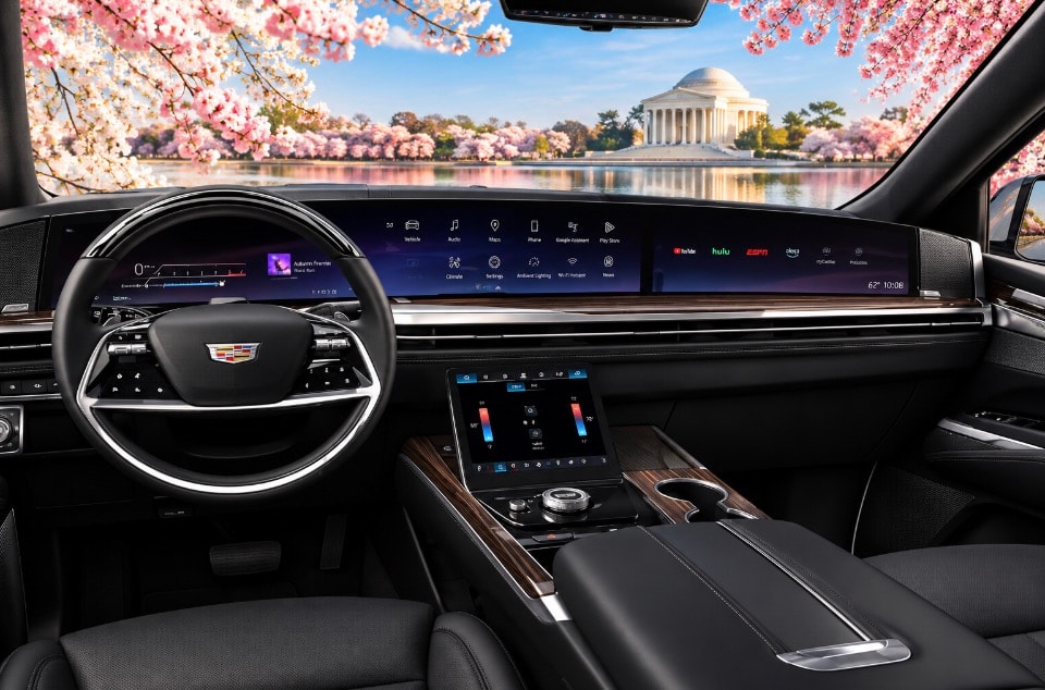 Cadillac Escalade Premium luxury dashboard interior with panoramic cherry blossom view