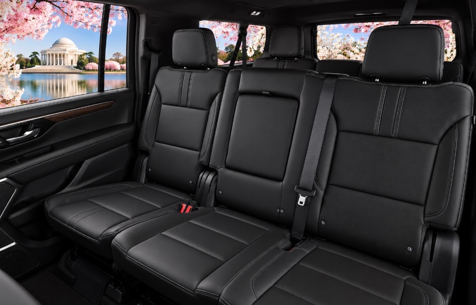 Chevrolet Suburban rear row black leather bench seat cherry blossoms Jefferson Memorial