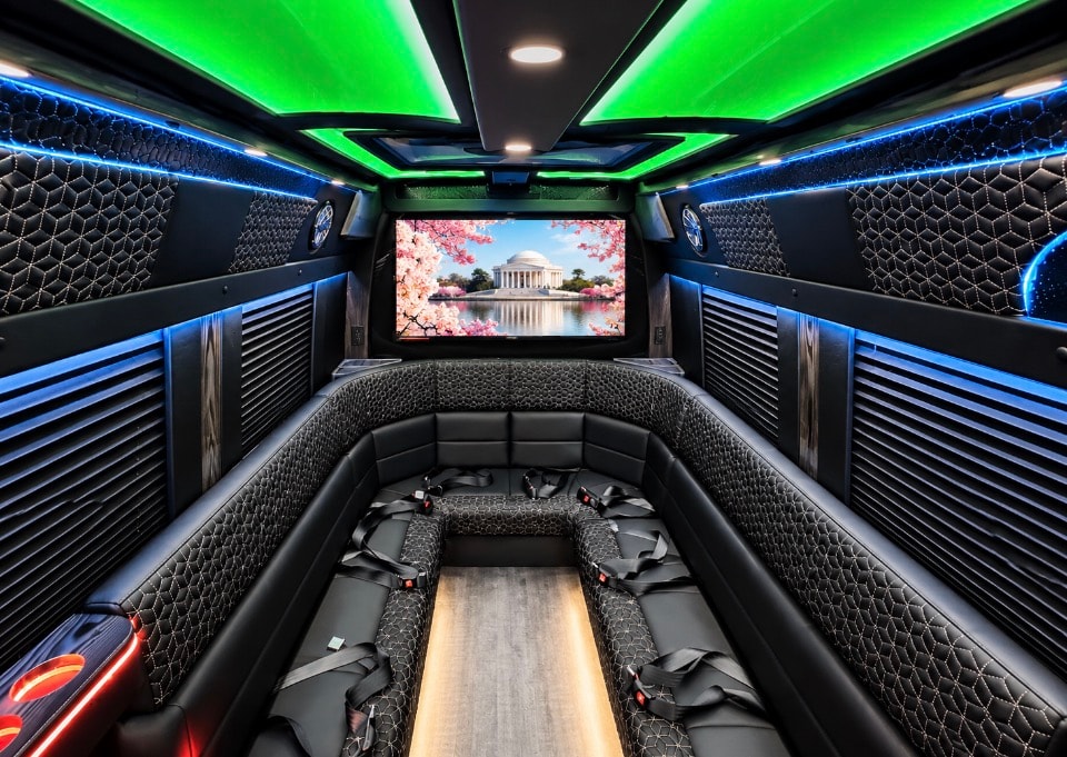 Luxury Sprinter limo interior green blue LED U-shape lounge seating rear TV cherry blossoms