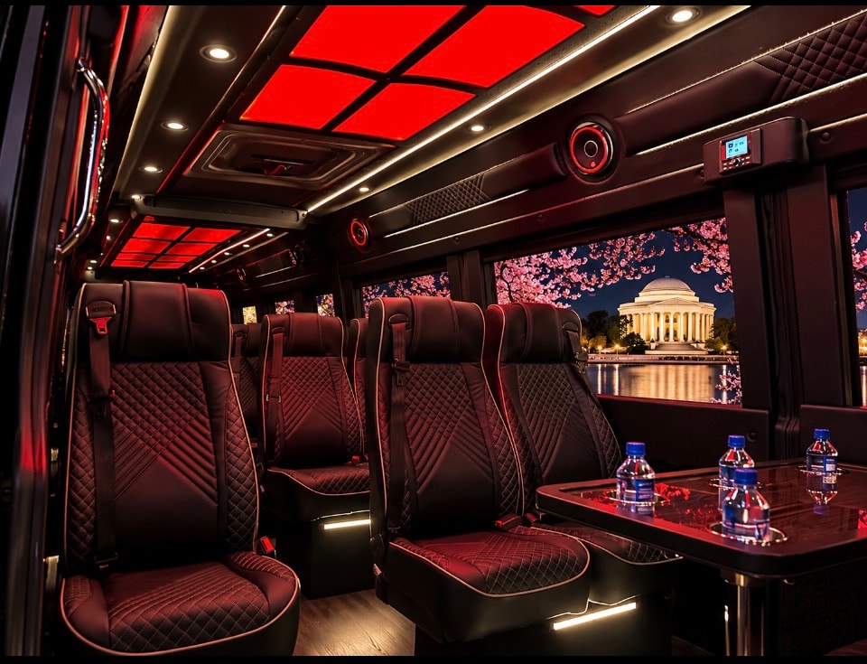 Mercedes-Benz Sprinter interior red ceiling ambient lighting luxury seats water bottles Jefferson Memorial night