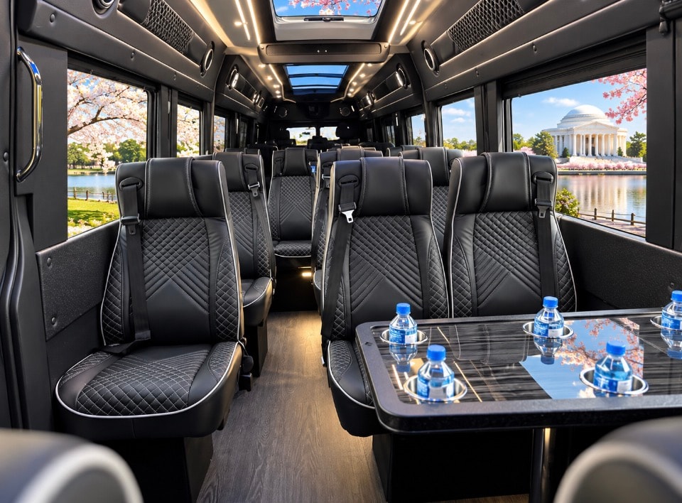 Mercedes-Benz Sprinter interior quilted leather seats water bottles cherry blossom daytime view