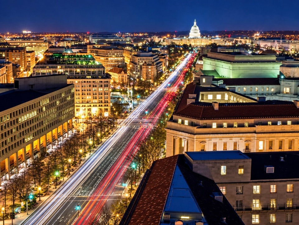 Washington DC Pennsylvania Avenue night aerial view with Capitol building and traffic trails