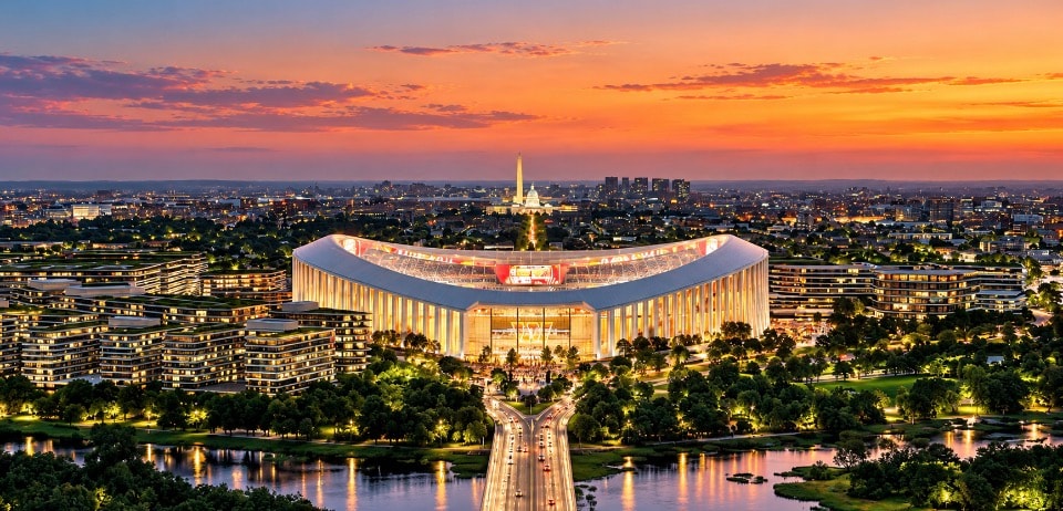 New Washington Commanders stadium aerial view at sunset with Washington Monument and Capitol